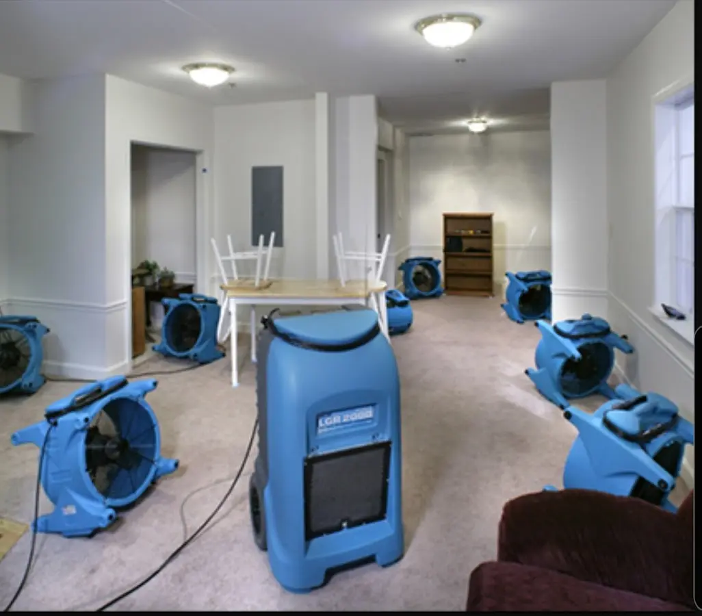 Air movers and dehumidifier setup for Water Damage Restoration in Red Chute